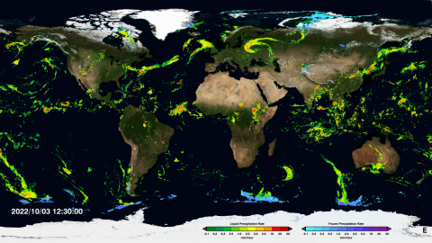 Global map with colors indicating areas of detected rain; heavier rain is indicated in yellow and red; lighter rain is indicated in green; snow/frozen precipitation is indicated in blue