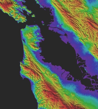 ASTER GDEM example showing an image of San Francisco with colors indicating topographic relief.